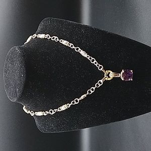 Silver Tone Necklace with exquisite faceted Purple Crystal pendant